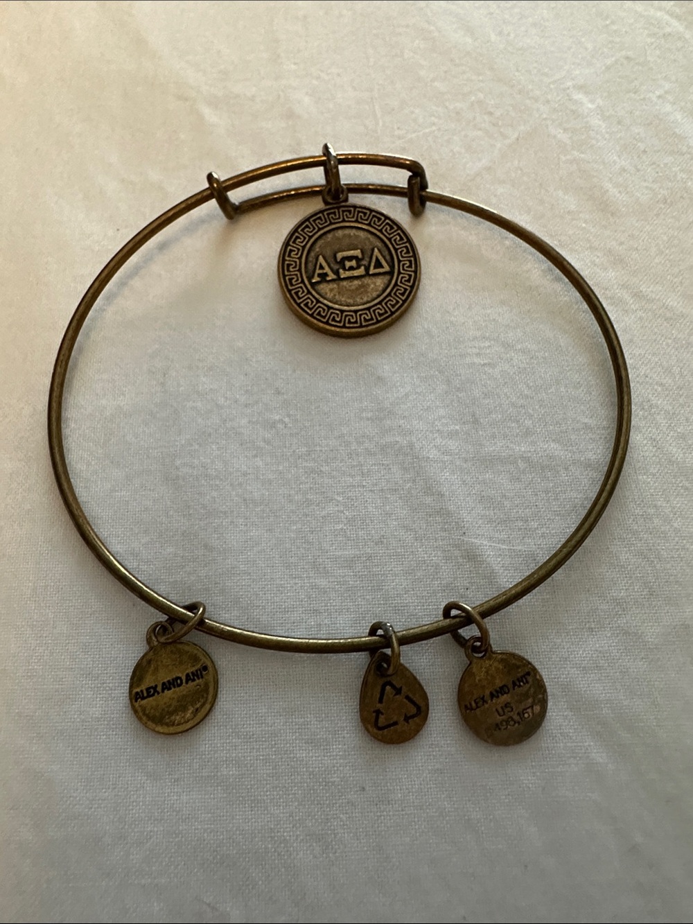 Alex and Ani Greek Key Bronze Expandable Bracelet with charms